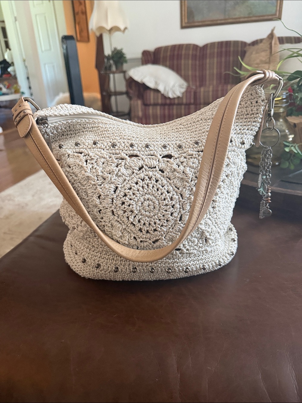 The Sak Crochet Hobo Shoulder Bag in Light Beige with Tan Strap